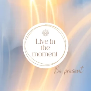 Words: Live in the present moment. Be present. On a blue background with golden petals
